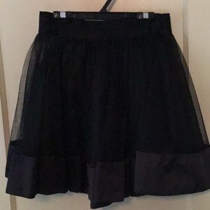 See-thru net skirt by Bebe